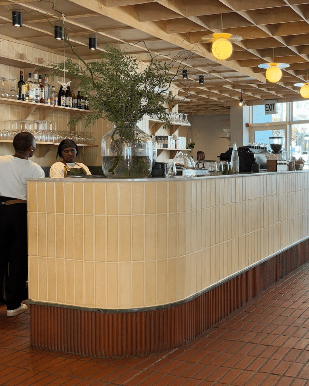 Juno cafe counter featuring Klay terracotta flooring and cladding